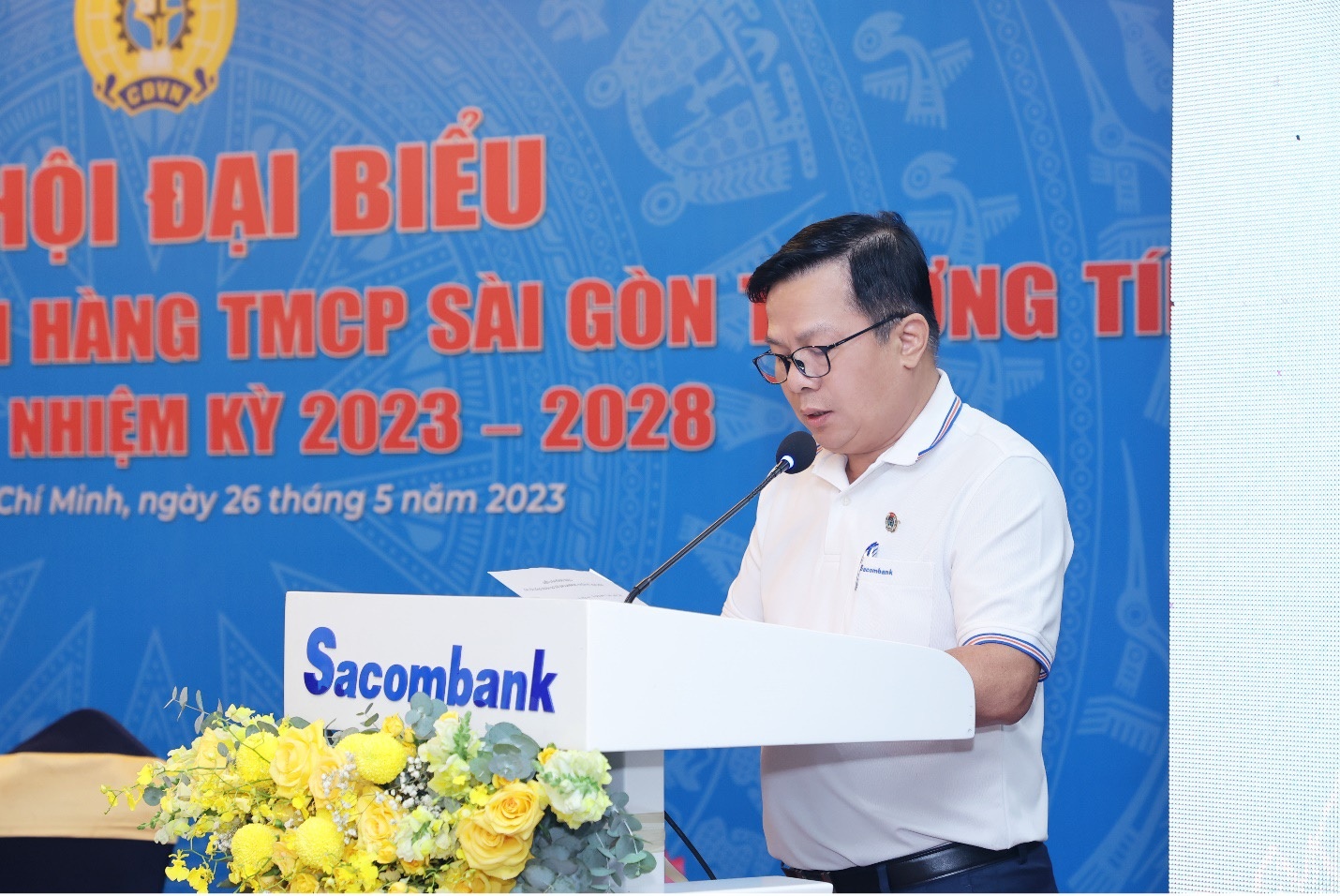 Ông Đào Nguyên Vũ – Đại diện Đoàn Chủ tịch báo cáo Tổng kết hoạt động CĐCS Sacombank (nhiệm kỳ 2019 - 2023) và Phương hướng hoạt động CĐCS nhiệm kỳ 2023 - 2028.