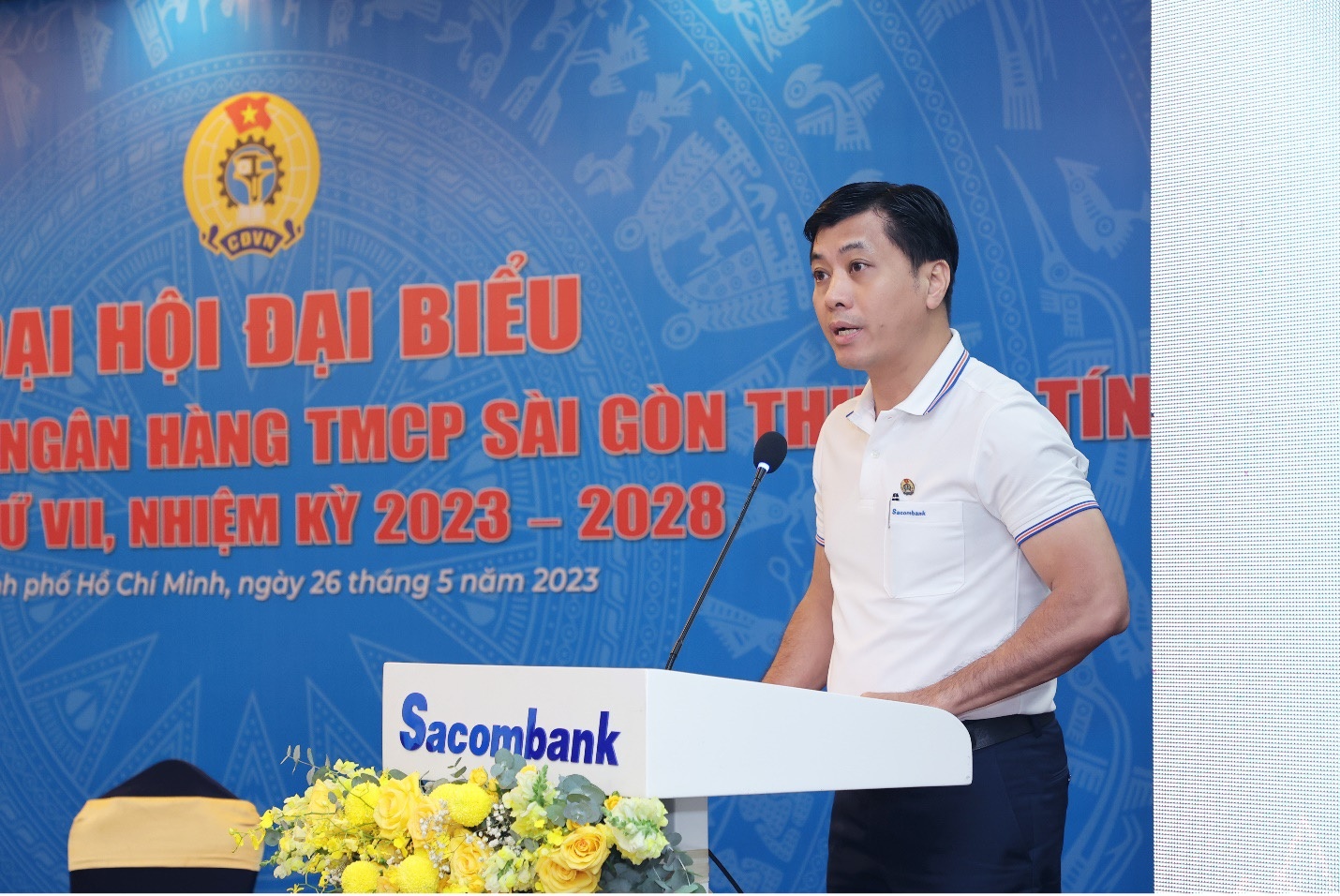 Ông Lê Đức Thịnh thay mặt Ban chấp hành CĐCS Sacombank nhiệm kỳ 2019 - 2023 đọc báo cáo kiểm điểm hoạt động của Ban chấp hành