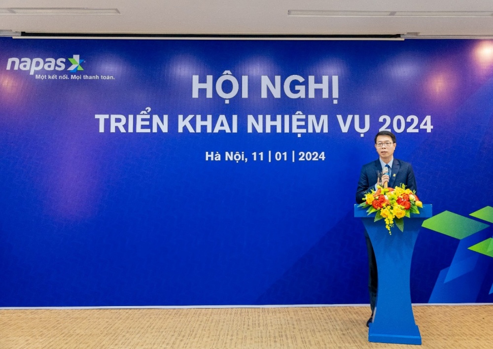 Ông Nguyễn Quang Hưng – Chủ tịch HĐQT NAPAS trình bày báo cáo kết quả hoạt động năm 2023