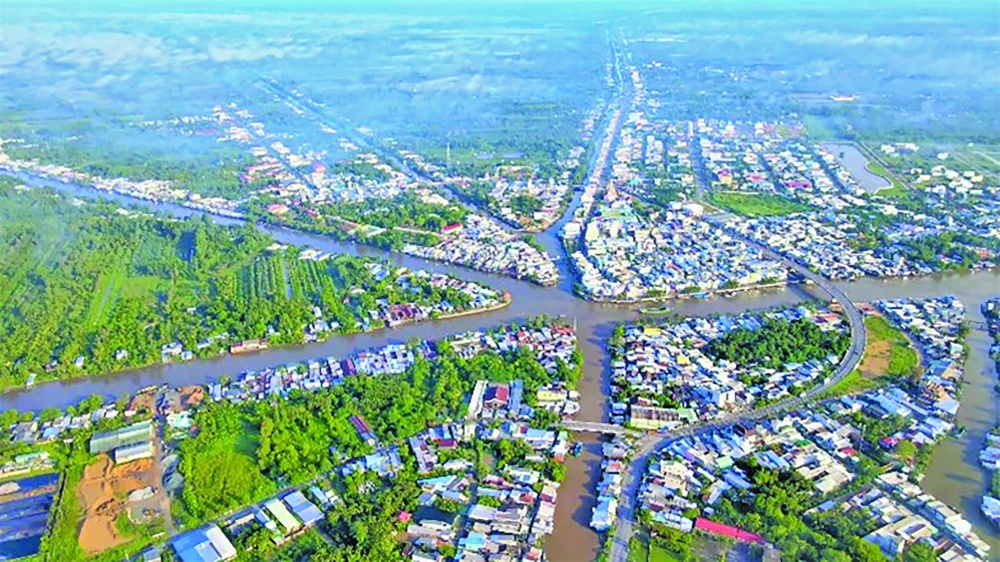 Những đô thị bao bọc xung quanh các nhánh sông Cửu Long là nét đặc trưng của vùng Tây Nam bộ (TP. Ngã Bảy tỉnh  Hậu Giang nhìn từ trên cao) 