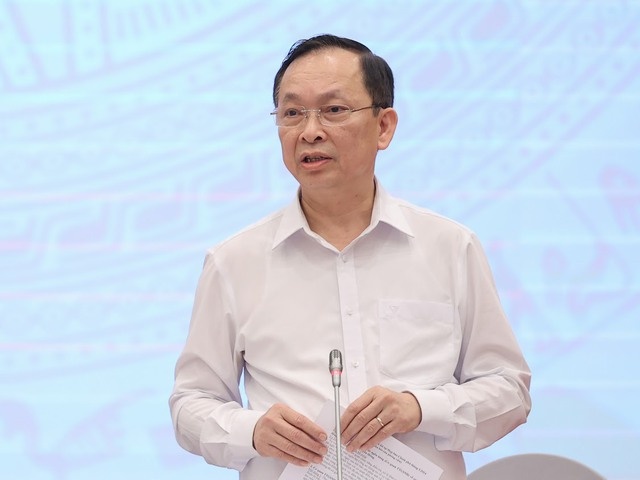 Phó Thống đốc Đào Minh Tú trả lời tại họp báo (Ảnh: VGP/Nhật Bắc)