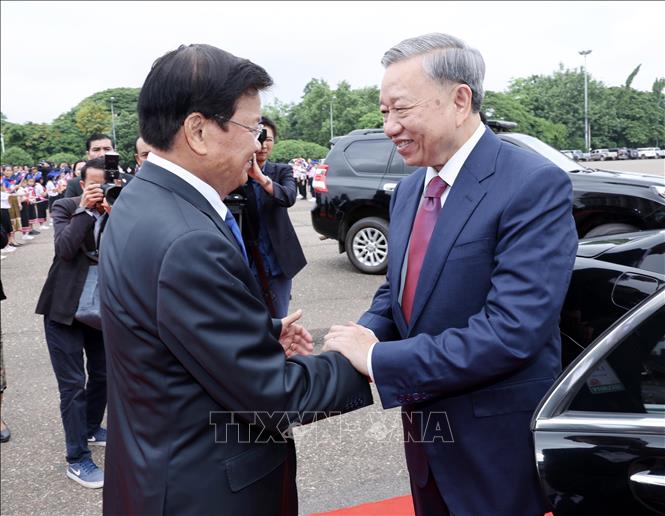 Lễ đón chính thức Chủ tịch nước Tô Lâm thăm cấp Nhà nước tới Lào- Ảnh 1.