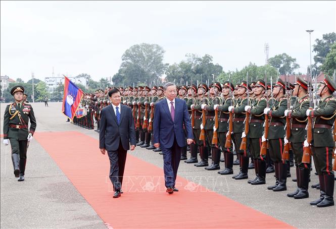 Lễ đón chính thức Chủ tịch nước Tô Lâm thăm cấp Nhà nước tới Lào- Ảnh 4.