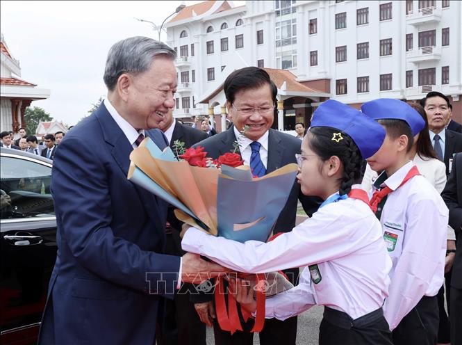 Lễ đón chính thức Chủ tịch nước Tô Lâm thăm cấp Nhà nước tới Lào- Ảnh 2.