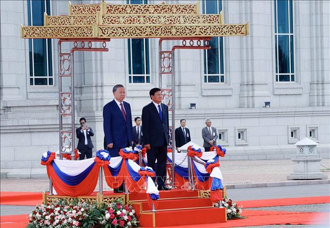 Lễ đón chính thức Chủ tịch nước Tô Lâm thăm cấp Nhà nước tới Lào- Ảnh 3.
