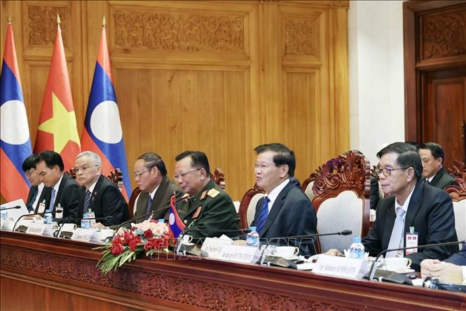 Hai nhà lãnh đạo tái khẳng định chính sách nhất quán của cả hai nước là luôn coi trọng và dành ưu tiên cao nhất cho việc củng cố, vun đắp quan hệ hữu nghị vĩ đại, đoàn kết đặc biệt và hợp tác toàn diện Việt Nam-Lào - Ảnh: TTXVN