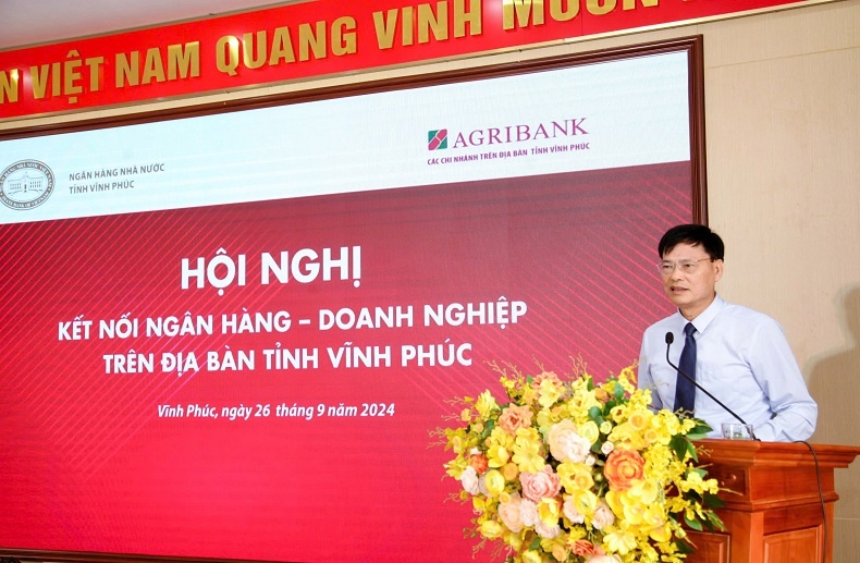 Ông Hoàng Duy Chinh, Giám đốc Ngân hàng Nhà nước chi nhánh tỉnh Vĩnh Phúc phát biểu tại hội nghị