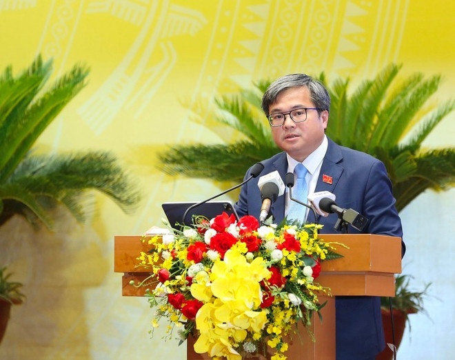 Phó Chủ tịch UBND thành phố Hà Nội Trương Việt Dũng trình bày báo cáo tại Kỳ họp. Phó Chủ tịch UBND thành phố Hà Nội Trương Việt Dũng trình bày báo cáo tại Kỳ họp.