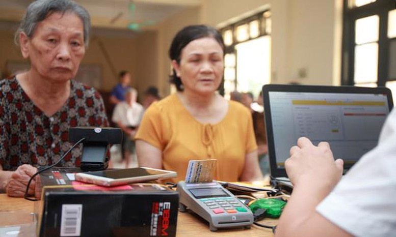 Hà Nội phê duyệt Đề án thí điểm chi trả an sinh xã hội không dùng tiền mặt Hà Nội phê duyệt Đề án thí điểm chi trả an sinh xã hội không dùng tiền mặt