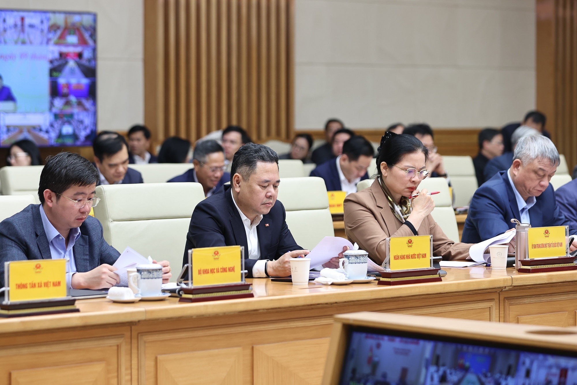 Phó Thống đốc NHNN Nguyễn Ngọc Cảnh và các đại biểu tham dự Hội nghị - Ảnh: VGP/Nhật Bắc
