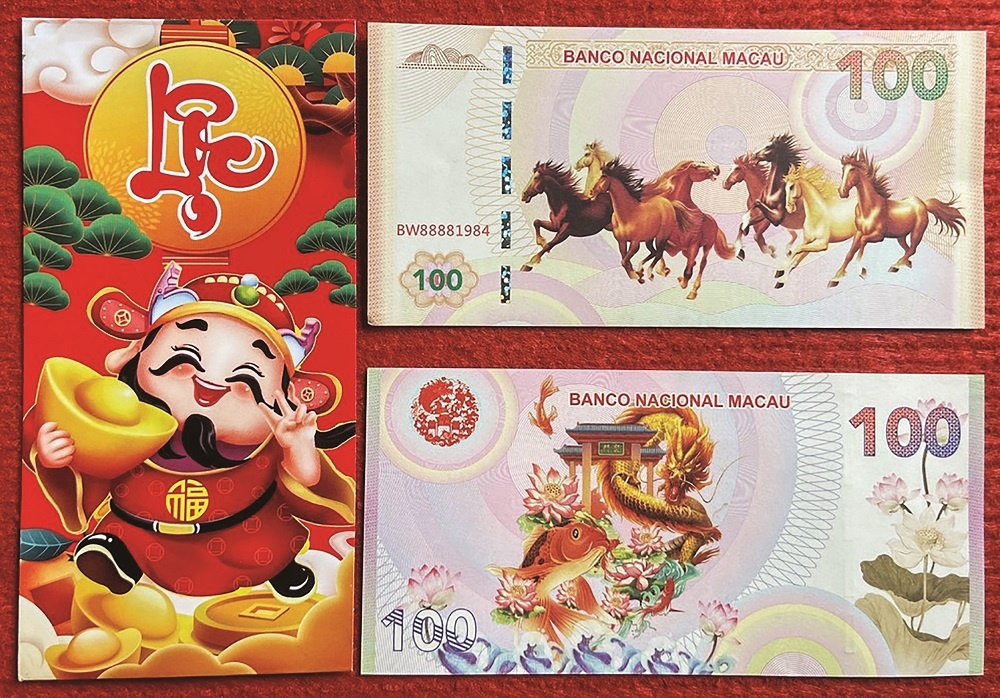 Tiền Mã đáo thành công Macao, một mặt là hình ảnh 8 chú ngựa, mặt còn lại là hình ảnh cá chép hóa rồng Tiền Mã đáo thành công Macao, một mặt là hình ảnh 8 chú ngựa, mặt còn lại là hình ảnh cá chép hóa rồng