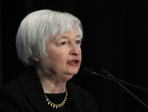 Fed tiến gần hơn đến việc tăng lãi suất, nhưng hạ dự báo về triển vọng kinh tế