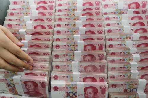 Dự trữ ngoại hối của Trung Quốc giảm lần đầu tiên trong 13 tháng