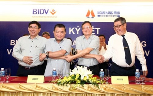 Sáp nhập MHB vào BIDV là thương vụ sáp nhập tiêu biểu Việt Nam 2015